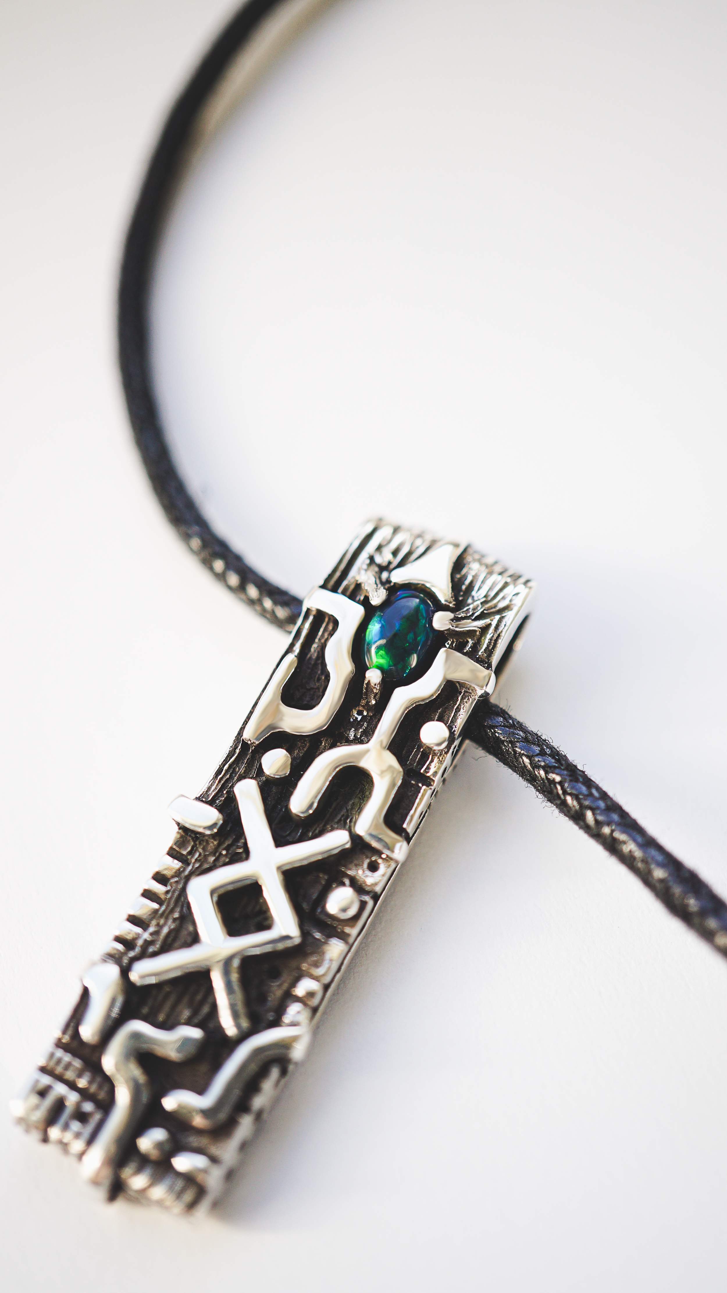 INGWAZ rune black opal pendant from sterling silver