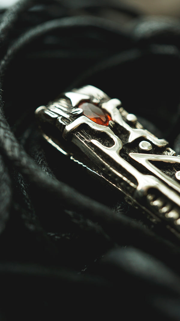 Uruz rune pendant from sterling silver with natural mexican fire opal