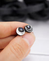Crescent Black Moon Stud Earrings, crafted with utmost precision from sterling silver and adorned with natural rainbow moonstone by moonique