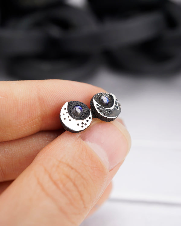 Crescent Black Moon Stud Earrings, crafted with utmost precision from sterling silver and adorned with natural rainbow moonstone by moonique