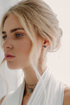 Crescent Black Moon Stud Earrings, crafted with utmost precision from sterling silver and adorned with natural rainbow moonstone by moonique