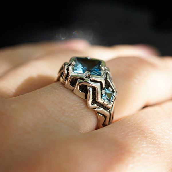 mens silver ring with blue topaz
