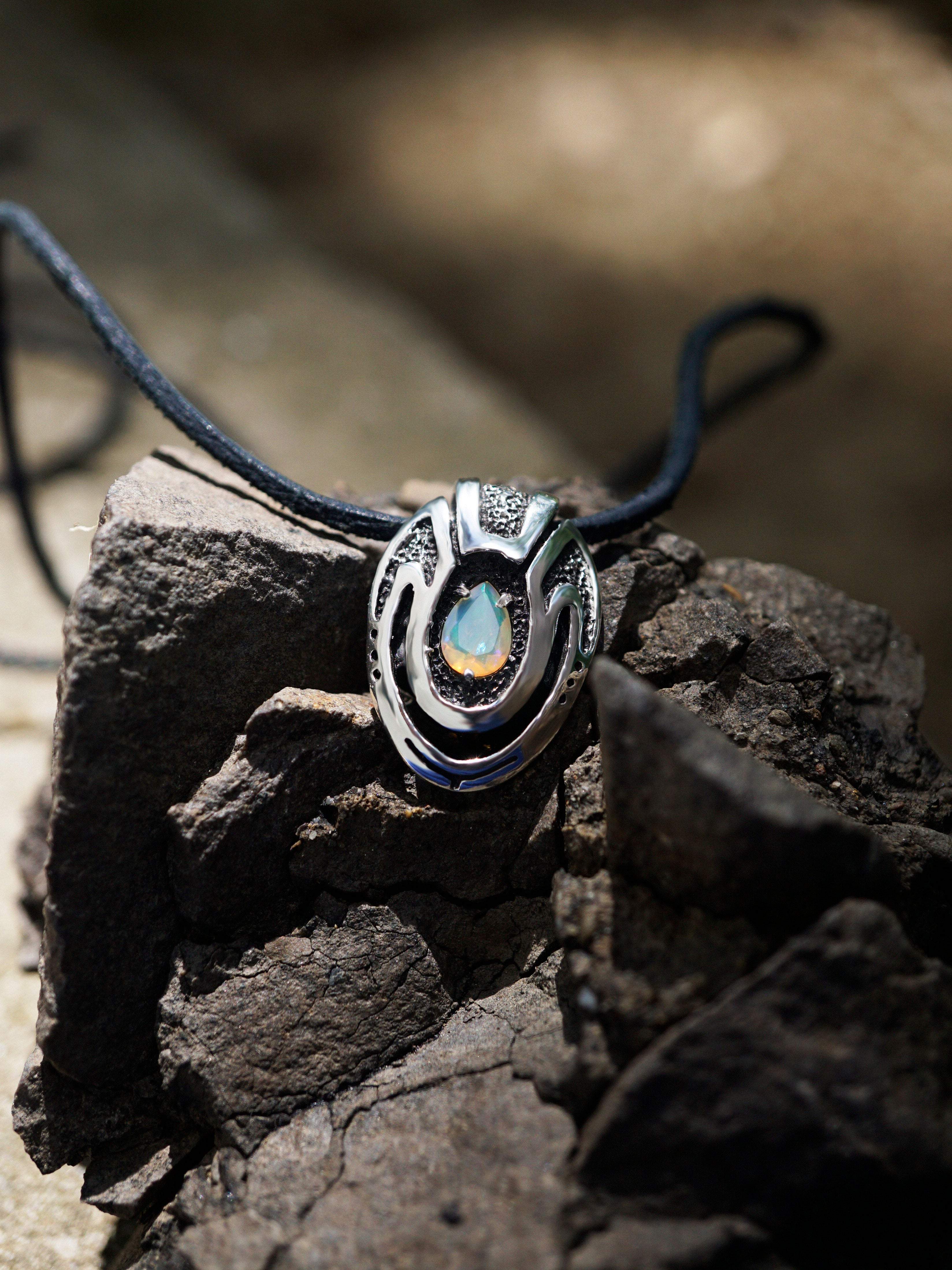 Unique custom pendant made from high quality solid sterling silver and natural adorable Ethiopian fire Opal with black cotton cord. This Opal necklace is handmade in cyberpunk jewelry style.  October birthstone, Unique necklace called Beetle. Jewelry by moonique.