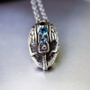 Mens unique statement pendant made from high quality solid oxidized sterling silver and natural London blue Topaz gemstone. This unique handmade pendant called Helmet. The form of the necklace is helmet of warrior. Custom high quality cyberpunk jewelry by moonique. 